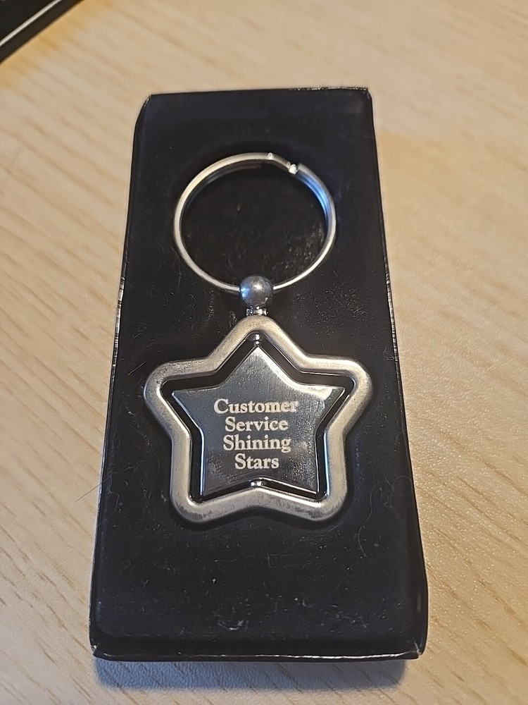 Customer Service Shining Star Silver Tone Engraved Steel Keychain Spinner Award-image
