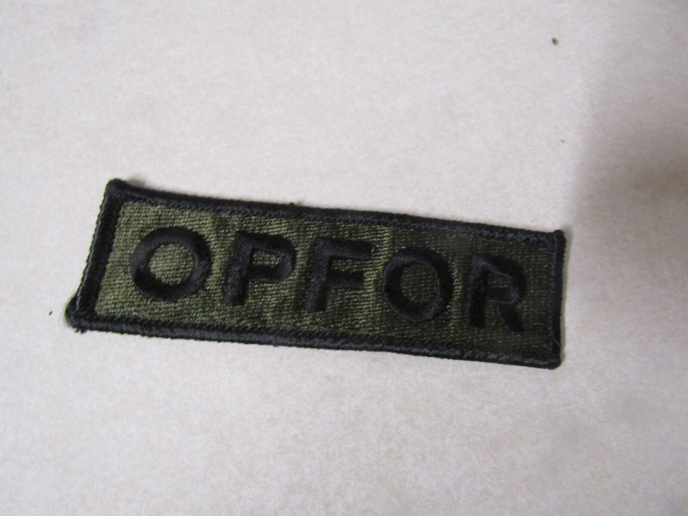 US MILITARY INSIGNIA PATCH BLACK ON GREEN BLACK BORDER OPFOR 4 1/4 INCH X 1 INCH