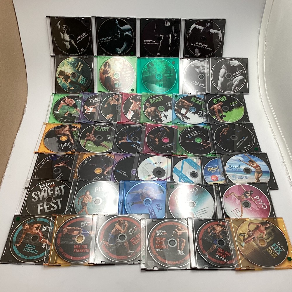 Lot of 40 Beachbody Workout DVDs - P90X, Insanity, PiYo, Body Beast & More