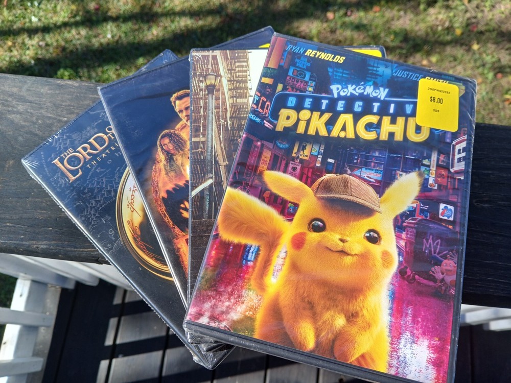 Lot 6 DVDs Jurassic World, Joker, Pokémon Pikachu, Lord Of The Rings 3 Film Co.